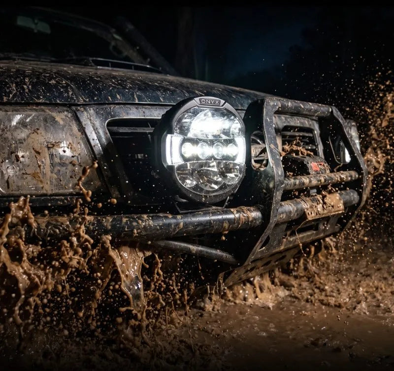 An ION-L-9 driving light on a muddy run at night